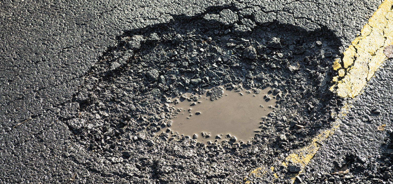 schade aan het asfalt